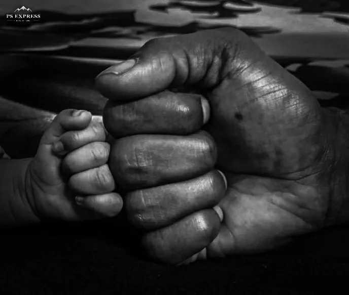 Avyaansh — his fist beside mine